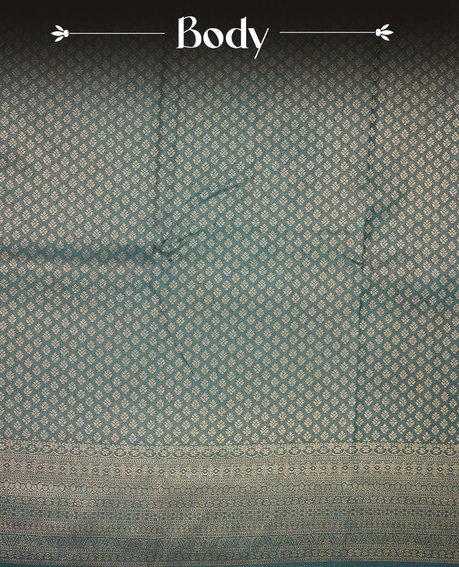 Teal colour semi soft silk saree featuring gold zari motifs on across body, self colour border with traditional gold zari pattern, pallu and paired with matching blouse.