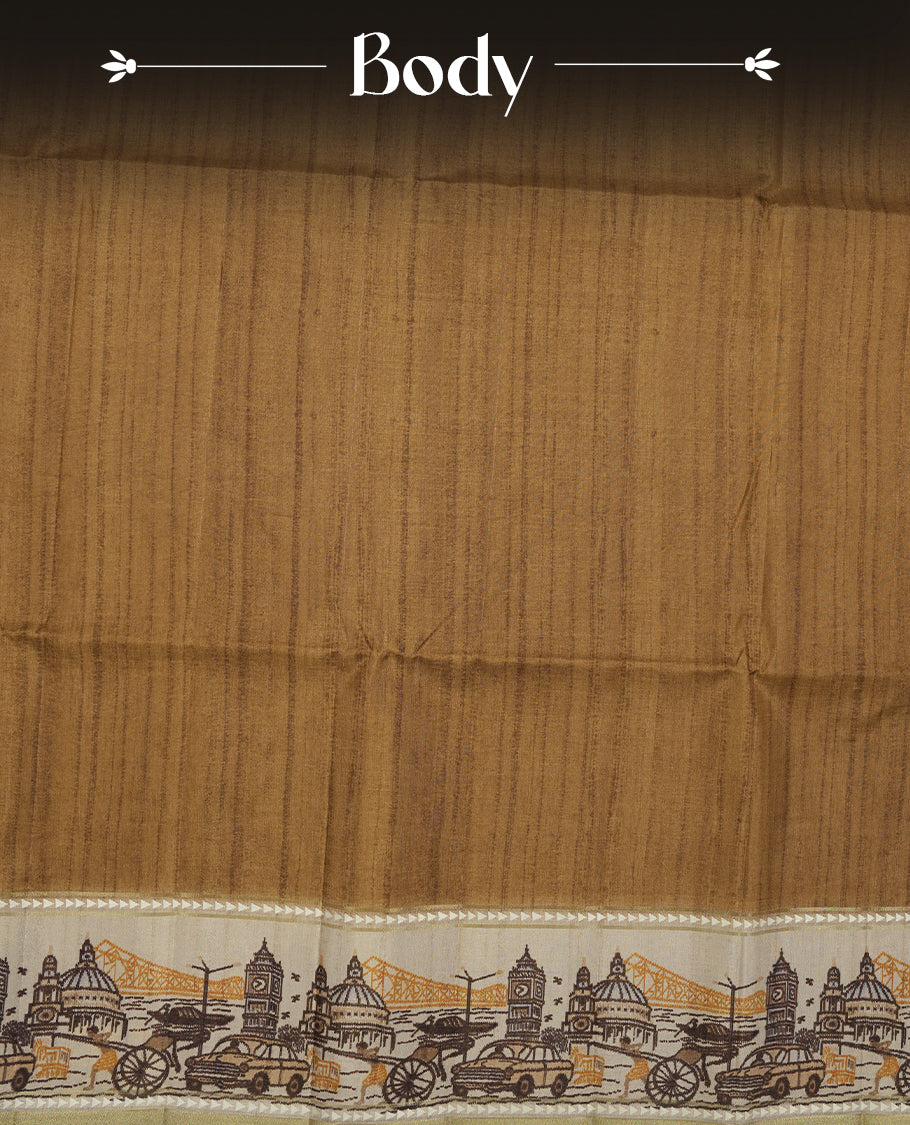 Khaki colour semi tusser silk saree featuring contrast cream colour London bridge printed pattern border and paired with matching blouse.