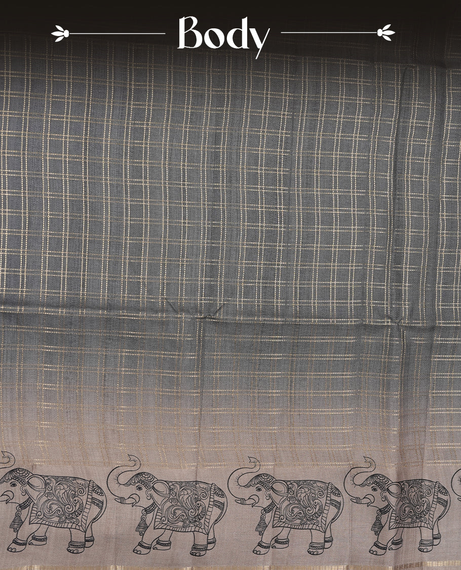 Gray colour semi tusser silk saree featuring Gold zari check pattern across body, faded contrast cream colour border with elephant print and paired with matching blouse.