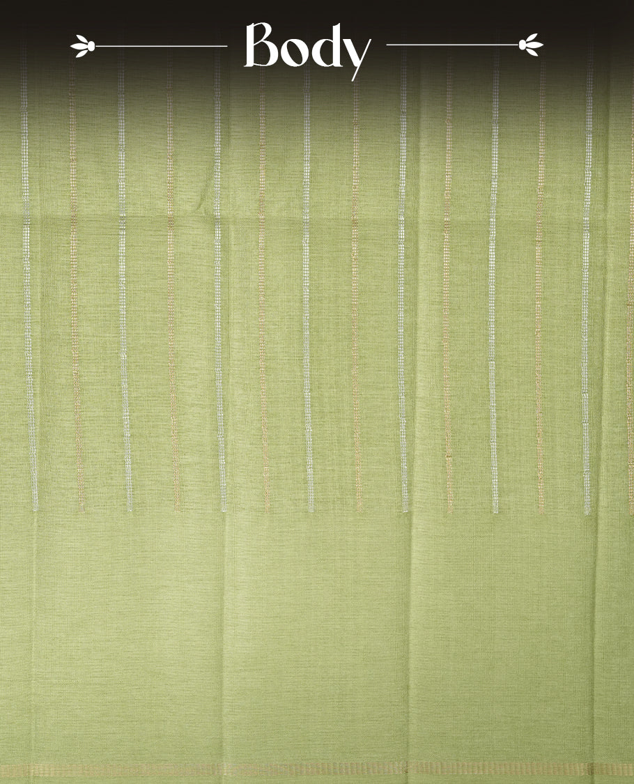 Pastel green colour semi tussar silk saree highlights gold and silver zari stripes across body, border, pallu and paired with matching blouse piece.