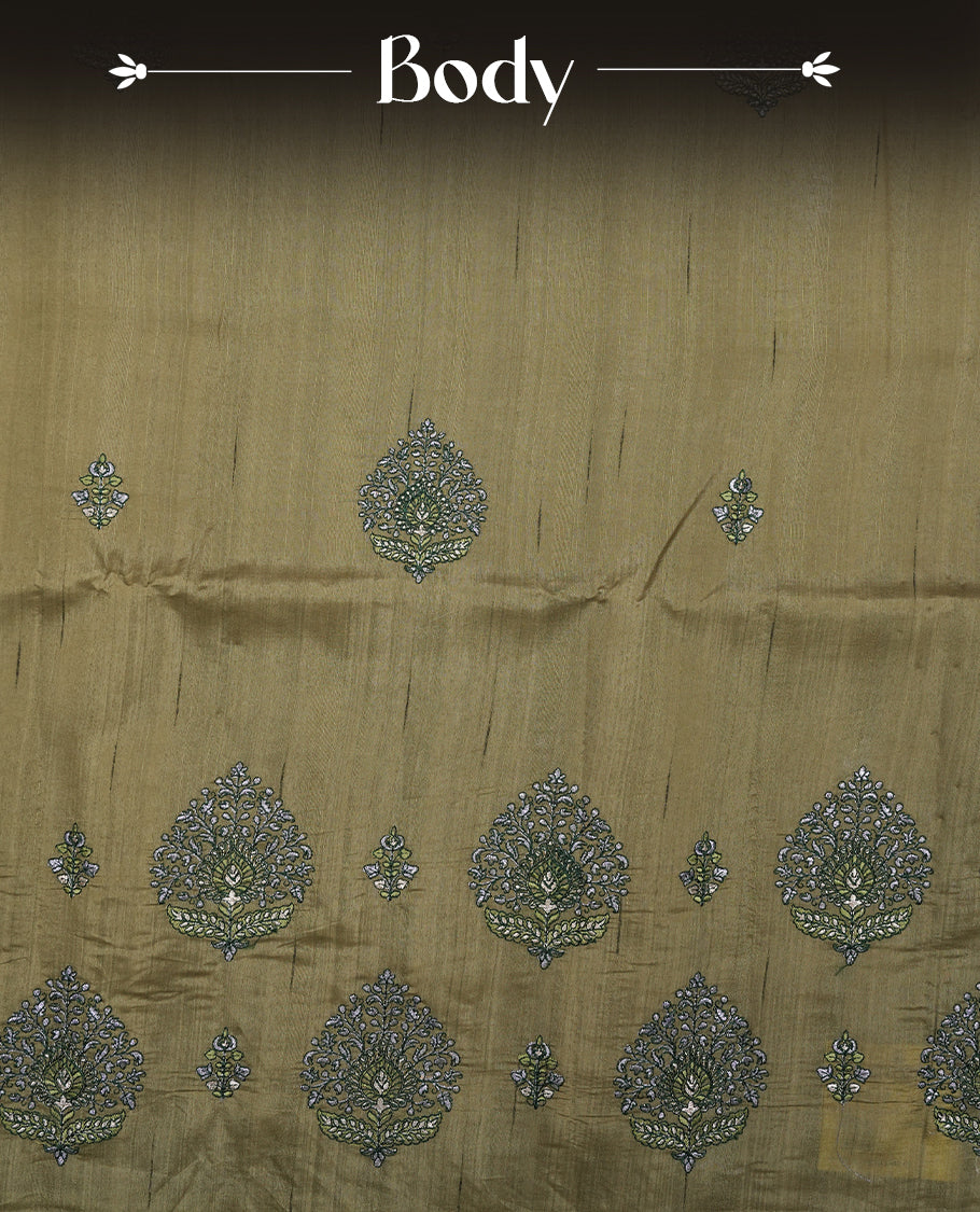Green colour semi tusser silk saree featuring Floral thread embroidery across body, without border and paired with matching blouse.