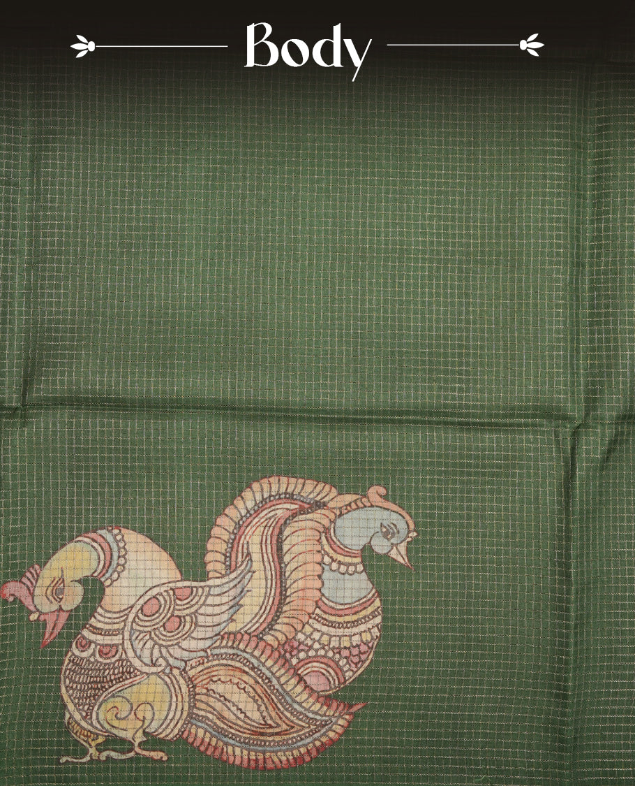 Green colour semi tussar silk saree featuring intricate peacock motifs on the pallu, subtle zari check pattern across the body, floral vine prints throughout, finished with tassels and paired with a matching printed blouse piece.