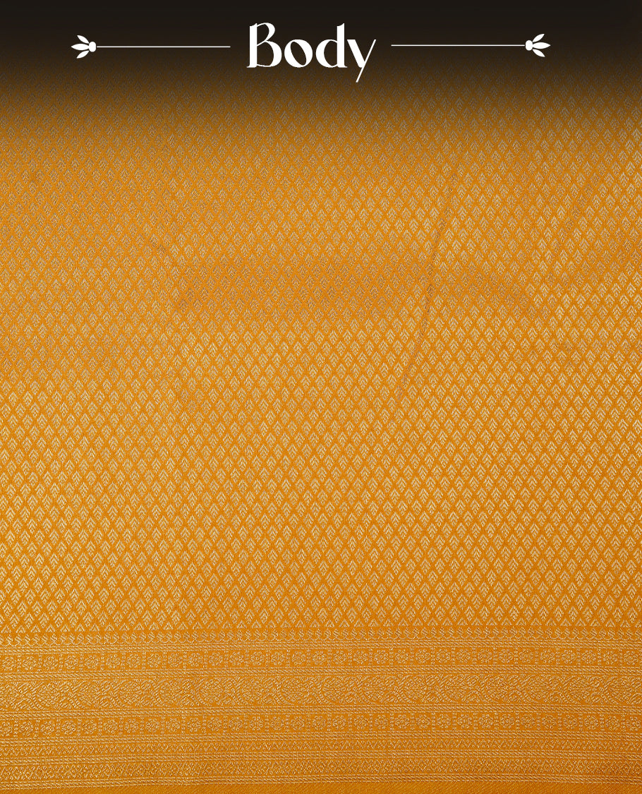 Yellow colour soft silk saree featuring gold zari pattern on body, complemented by self colour with traditional border, paired with matching blouse piece.