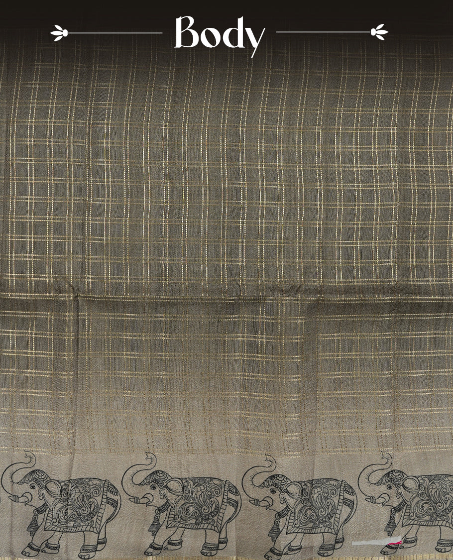 Green colour semi tusser silk saree featuring Gold zari check pattern across body, faded contrast cream colour border with elephant print and paired with matching blouse.