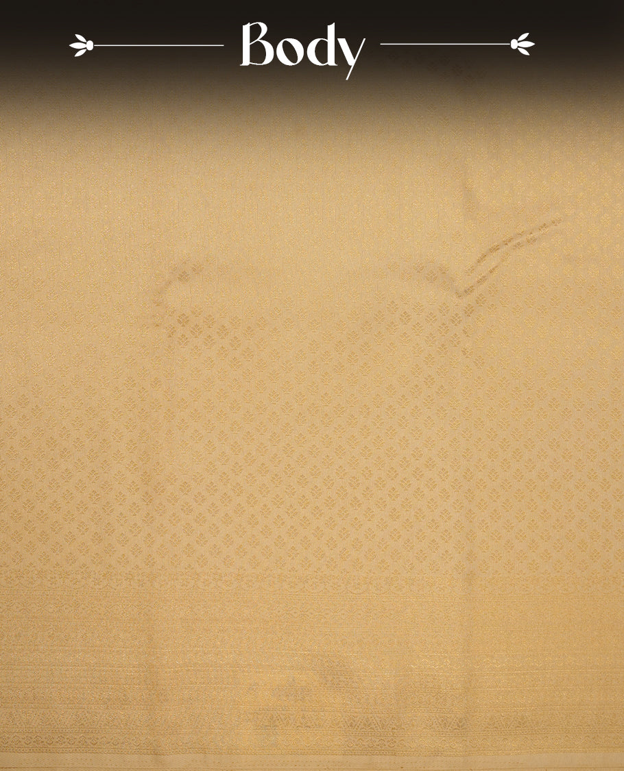 Beige colour semi soft silk saree featuring gold zari motifs on across body, self colour border with traditional gold zari pattern, pallu and paired with matching blouse.