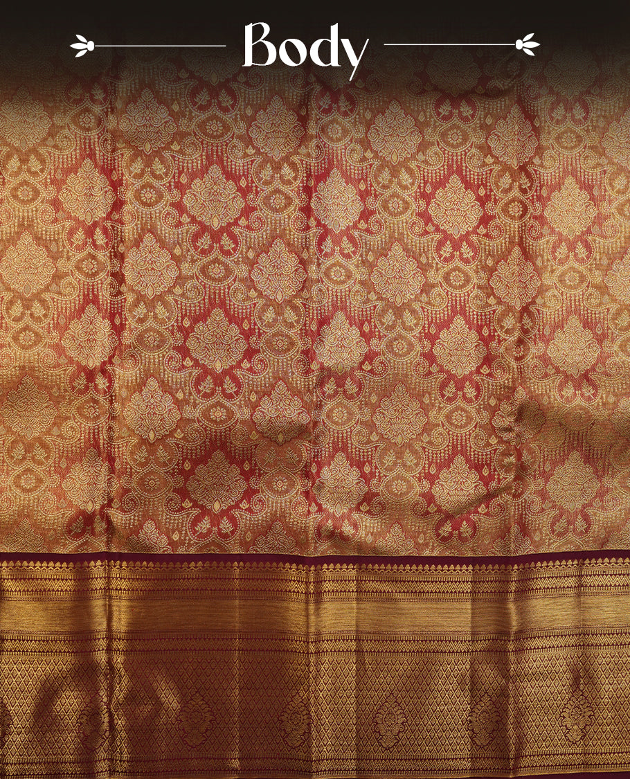 Red & gold double shade colour kancheepuram tissue silk saree highlighting gold zari pattern body, with contrast burgundy colour colour with traditional border and paired with matching blouse.