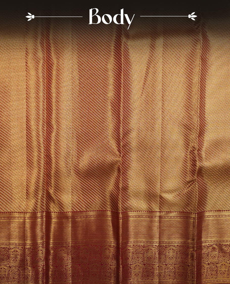 Red & gold double shade colour kancheepuram tissue silk saree highlighting gold stripped zari pattern body, with contrast burgundy colour colour with traditional border and paired with matching blouse.