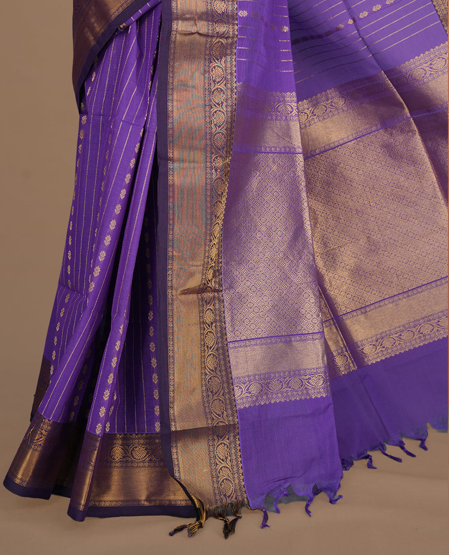 Medium Purple colour chettinad cotton saree featuring gold zari stripes on body, complemented by gold zari border, paired with matching blouse piece.