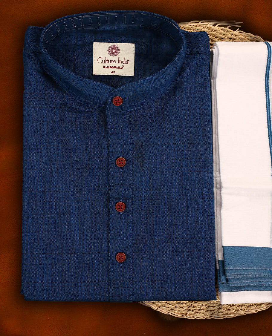 RAMRAJ Navy blue kurtha paired with a white dhoti, elegantly finished with a matching Navy blue border.