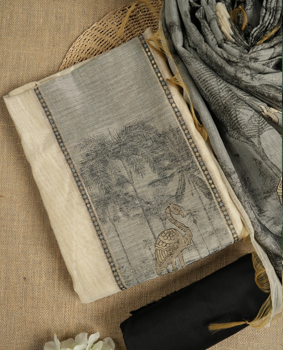 Beige & Black colour suit material adorned with intricate woven patterns, bird print & subtle motifs, exuding ethnic grace & paired with a beautifully bordered dupatta and a matching plain bottom.