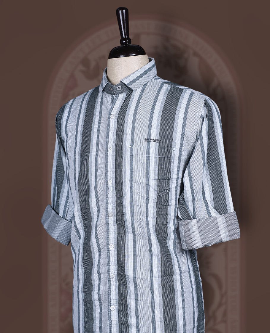Pastel green and off white self striped shirt crafted from soft Katrai cotton , Designed with roll up sleeves and a classic collar, this breathable piece blends traditional texture with a relaxed, modern silhouette.