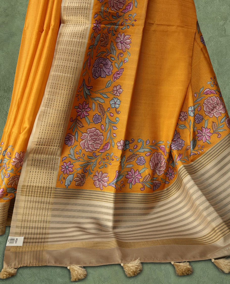 Mustard yellow colour Semi Tussar Silk saree with vibrant digital floral printed body and elegant Kandha work border & Paired with a matching blouse.