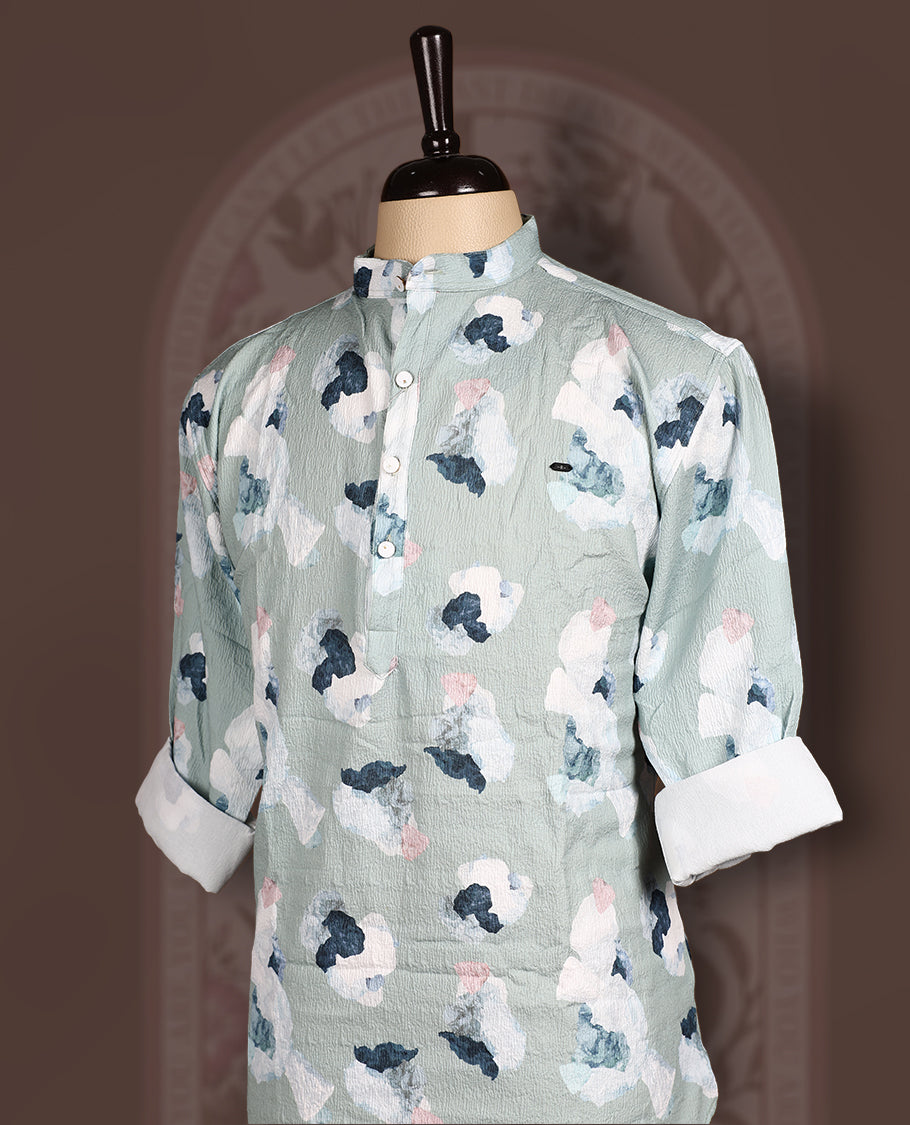 Pastel green colour short kurta in crush fabric with digital floral print, Features a mandarin collar and full sleeves, Lightweight, modern, and perfect for casual or semi-formal occasions.