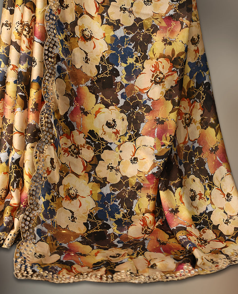 Yellow colour pure crepe saree with abstract floral print in earthy tones, highlighted by mirror work on the body and scalloped border, paired with a matching blouse.