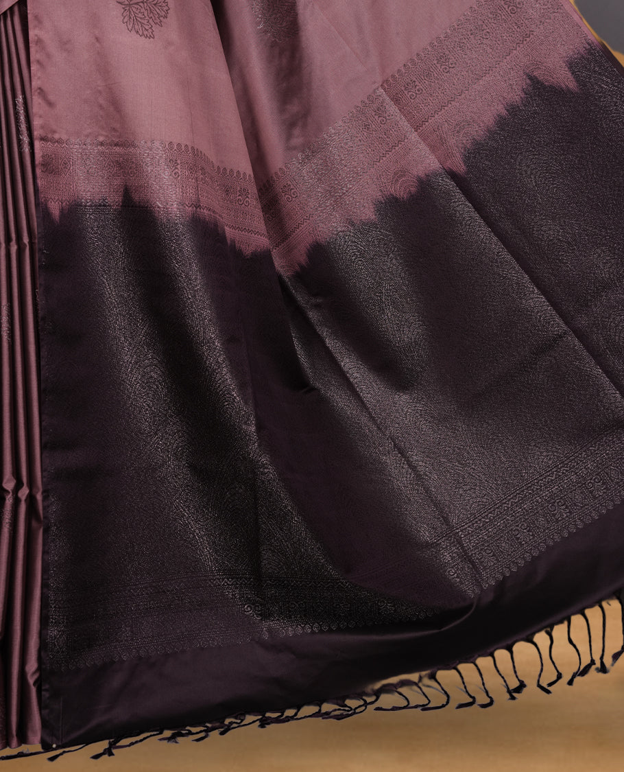 Mauve colour soft silk saree featuring Antique zari motifs on body with Highlighting contrast Plum purple colour pallu and paired with matching blouse piece.