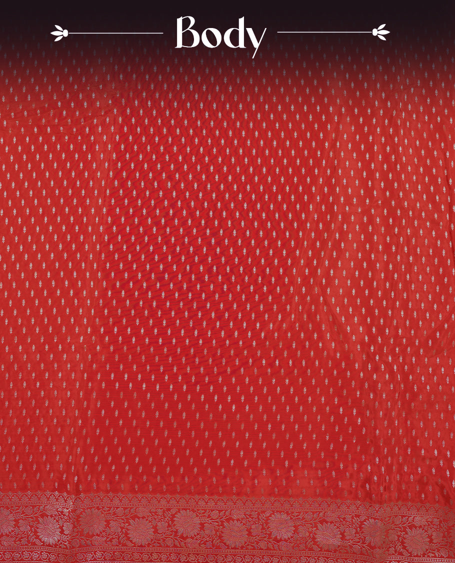 Bright red colour banaras satin crepe saree fearturing gold tiny leaf motifs on body, kodi visiri pattern on border & pallu and paired with matching blouse