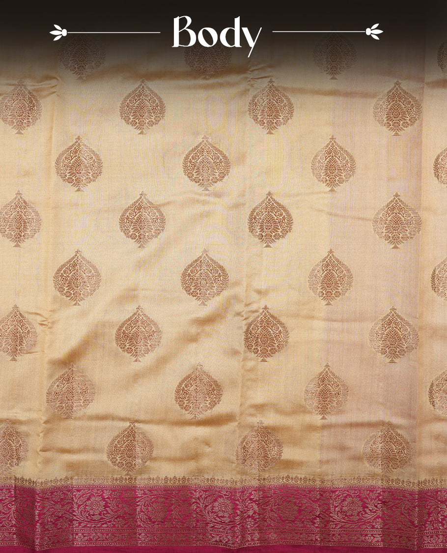 Cream beige Banaras soft silk saree with gold zari oval motifs on body, with contrast Pink colour floral pattern on pallu, border, and Matching blouse.