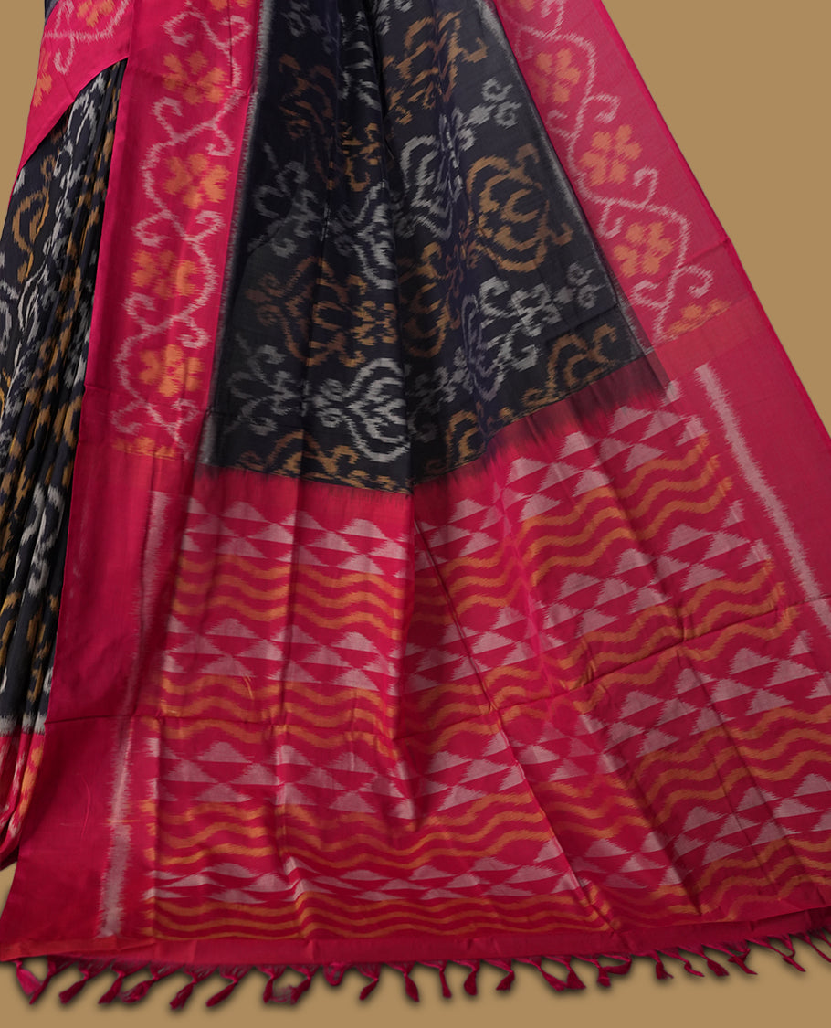 Navy blue colour Ikkat Pochampally saree featuring bold geometric motifs in beige, mustard, and grey with a striking contrast border, beautifully blending tradition with elegance, Comes with matching blouse.
