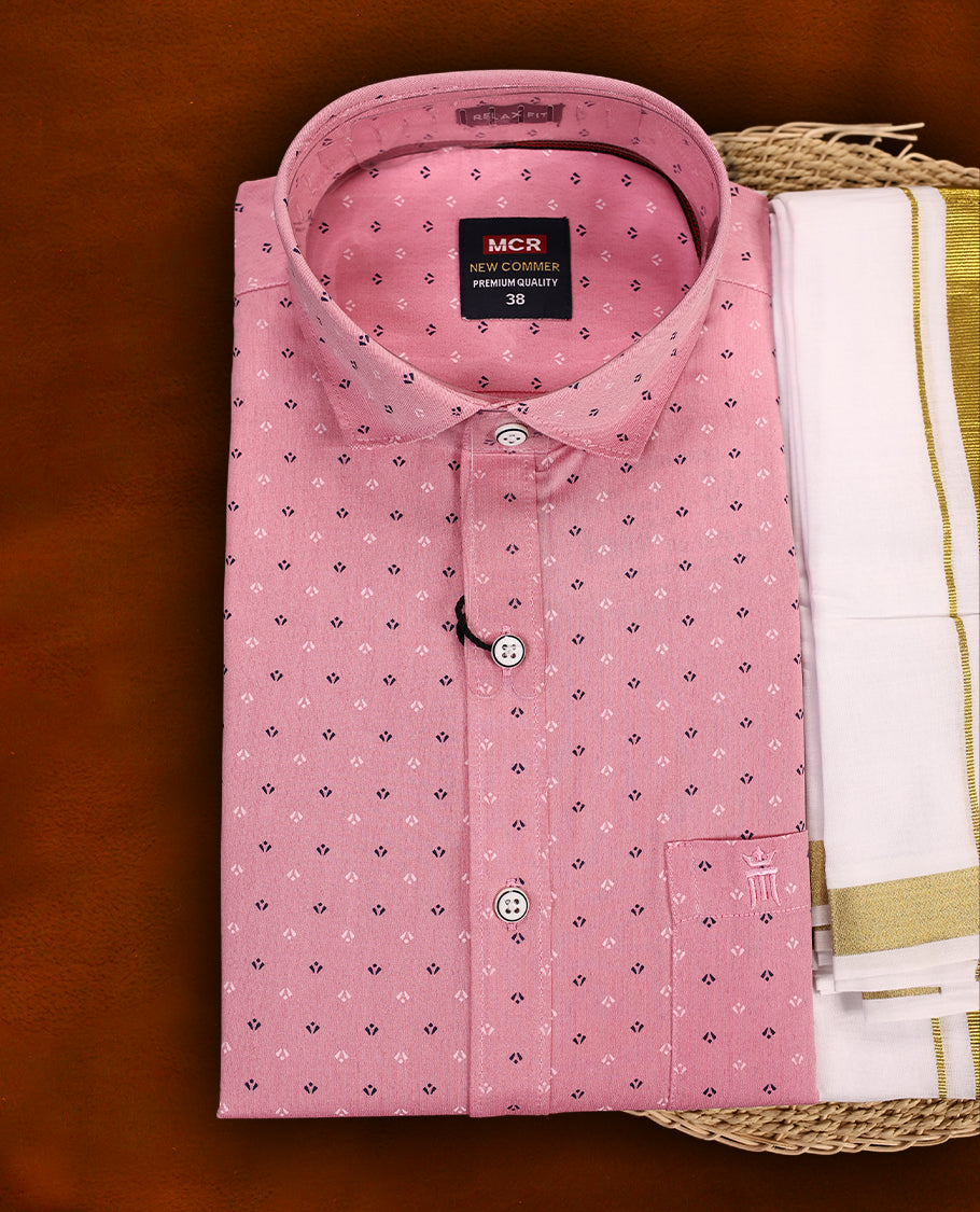 Pink colour MCR full sleeve shirt with delicate printed motifs, paired with a classic white dhoti featuring an elegant golden zari kara and a matching pink printed border.