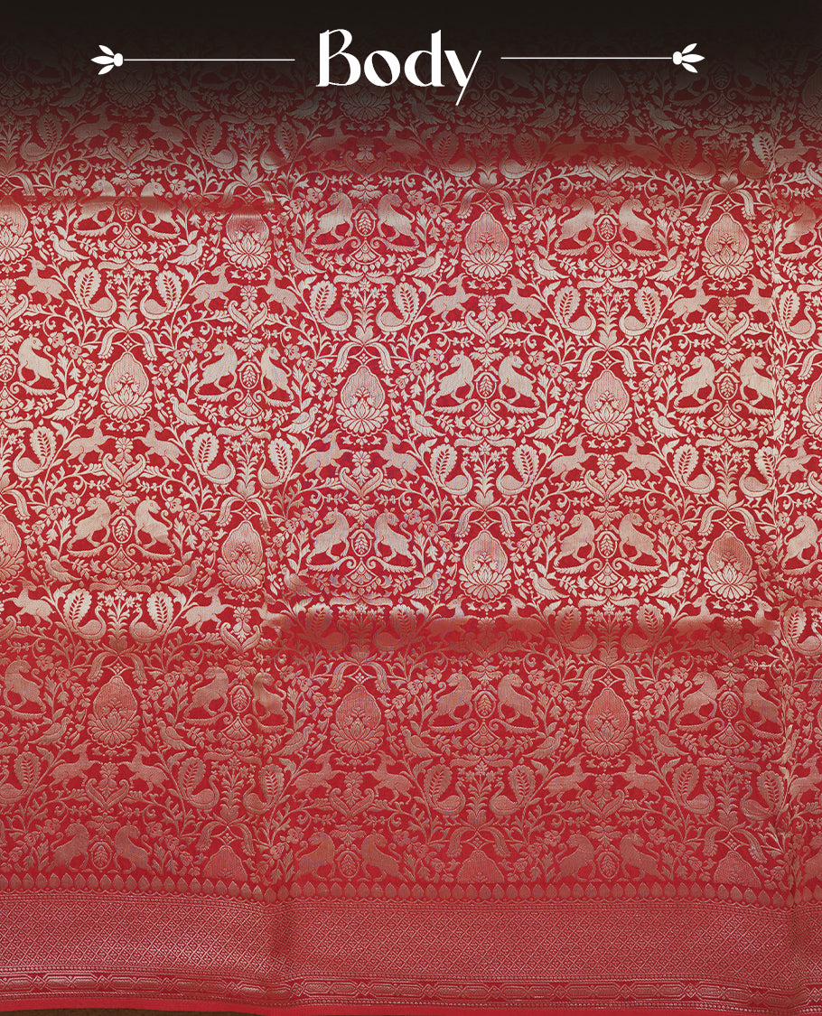 Dark red colour Mysore Crepe Silk saree fearturing gold Zari kodi visiri & Animal brocade pattern on body and self colour border paired with matching blouse