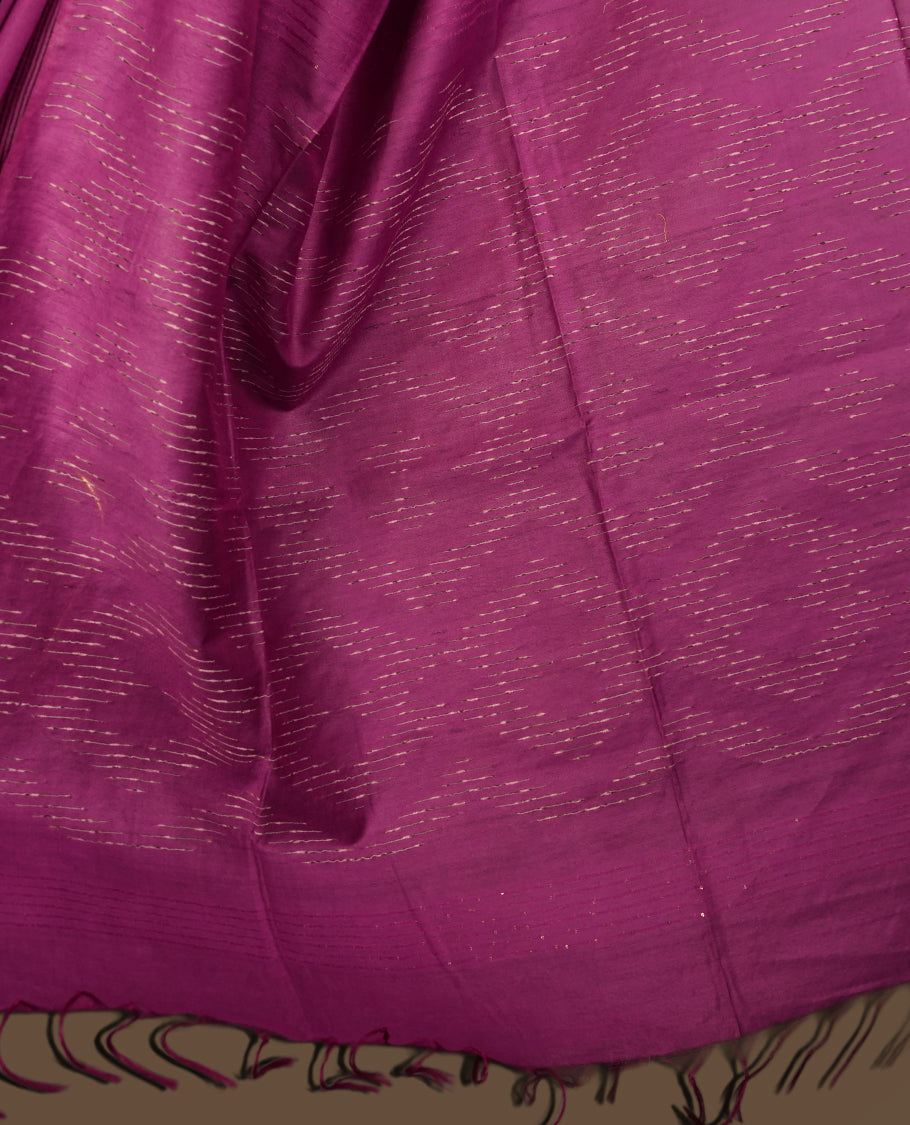 Magenta colour semi jute saree featuring subtle woven patterns and fine thread striped detailing, finished with tassels on the pallu & Comes with a matching blouse piece for a graceful traditional look.