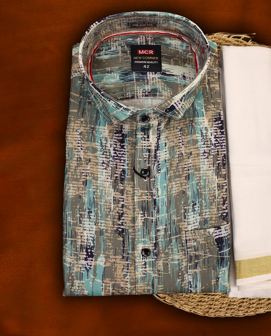 Multicolour abstract patterned MCR full sleeve shirt in shades of teal, grey, and navy, paired with a classic white dhoti featuring a rich golden zari kara and a matching multicolour printed border.