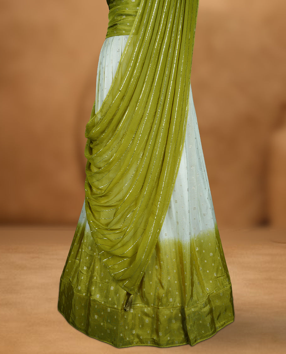 Off white semi banaras semi stitched dhavani set featuring gold zari motifs and contrast Olive colour border, unstitched gold zari blouse piece and matching Duptta with gold zari stripes.
