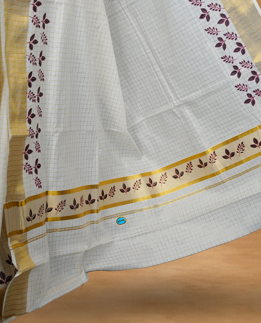 Off white colour cotton Kerala saree featuring a gold zari check pattern across body, a refined kasavu border with leaf print, paired with a matching blouse.
