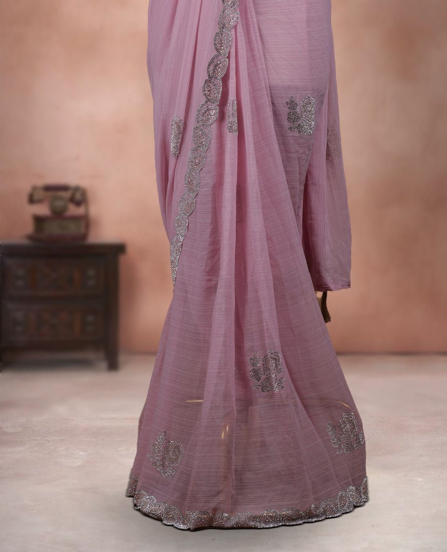 Elegant Baby Pink Colour ready to wear saree adorned with rich silver zari and bead embroidery along the border and pallu, paired with a heavily embellished matching blouse for a grand festive look.