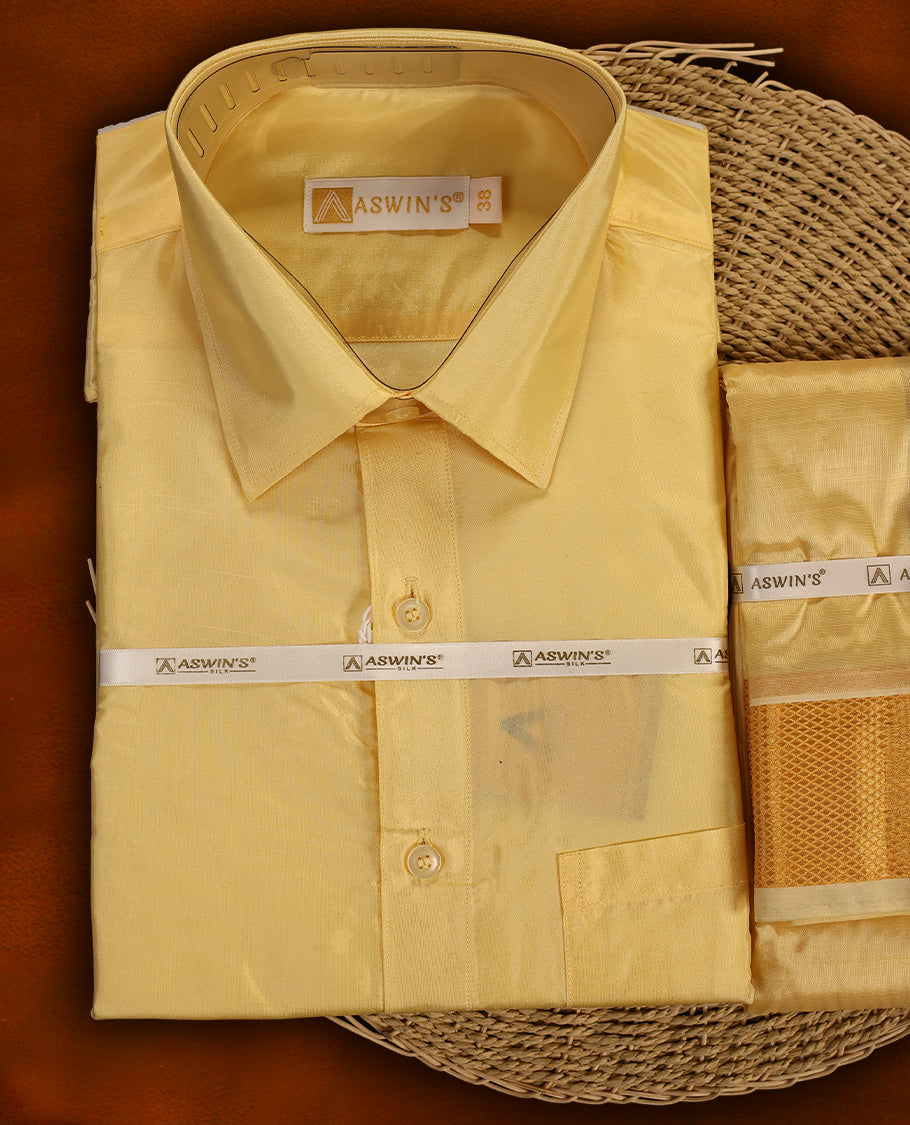 Sandal colour Aswin’s wedding set featuring a luxurious silk shirt, matching dhoti with elegant golden zari weave, paired with a towel and fragrance, crafted for weddings and festive grandeur.