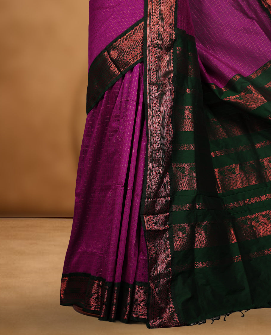 Magenta colour kalyani cotton saree featuring Antique zari check pattern on body, contrast Green colour border with antique zari pattern, paired with matching blouse piece.