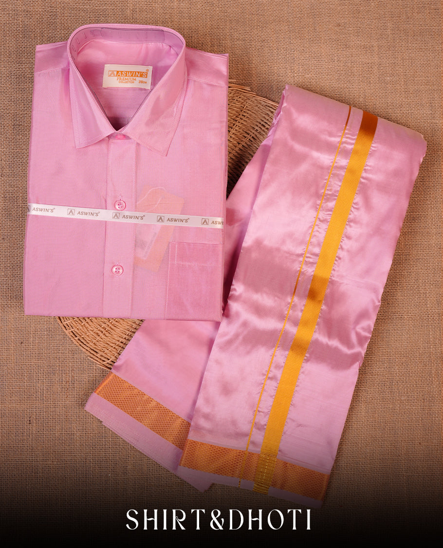 Pink colour shirt and dhoti with gold colour border, paired with matching colour silk saree featuring gold zari buttas and traditional border paired with matching blouse piece.