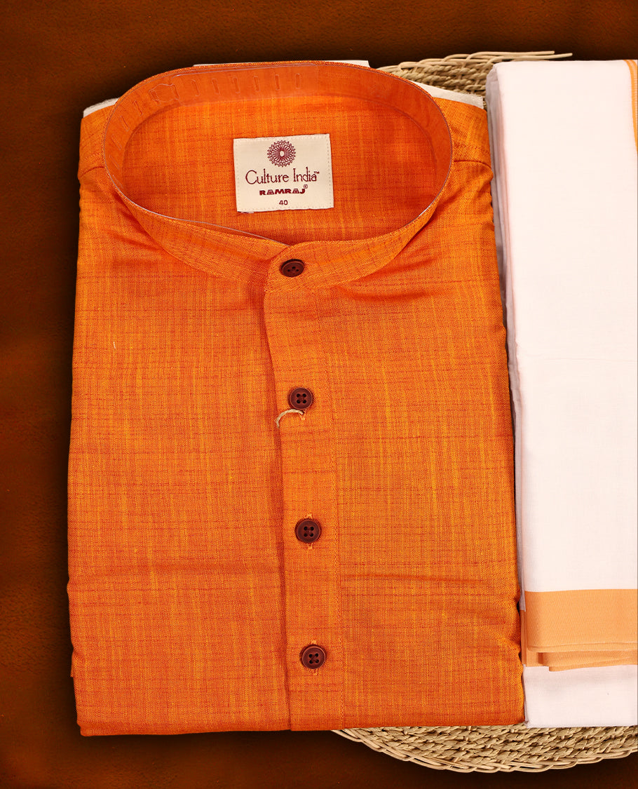 RAMRAJ Orange kurtha paired with a white dhoti, elegantly finished with a matching Orange border.