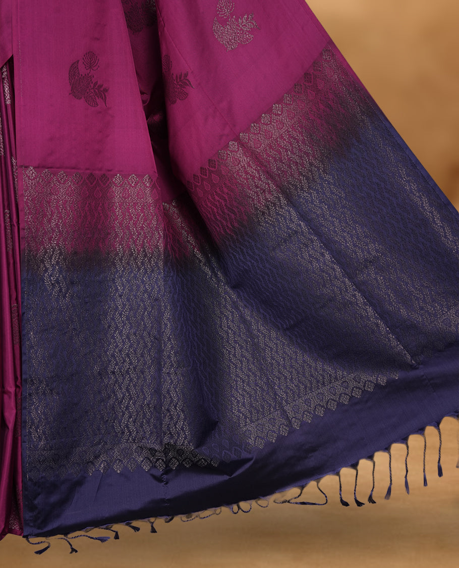 Boysenberry colour soft silk saree featuring Antique zari motifs on body with Highlighting contrast Navy blue colour pallu and paired with matching blouse piece.