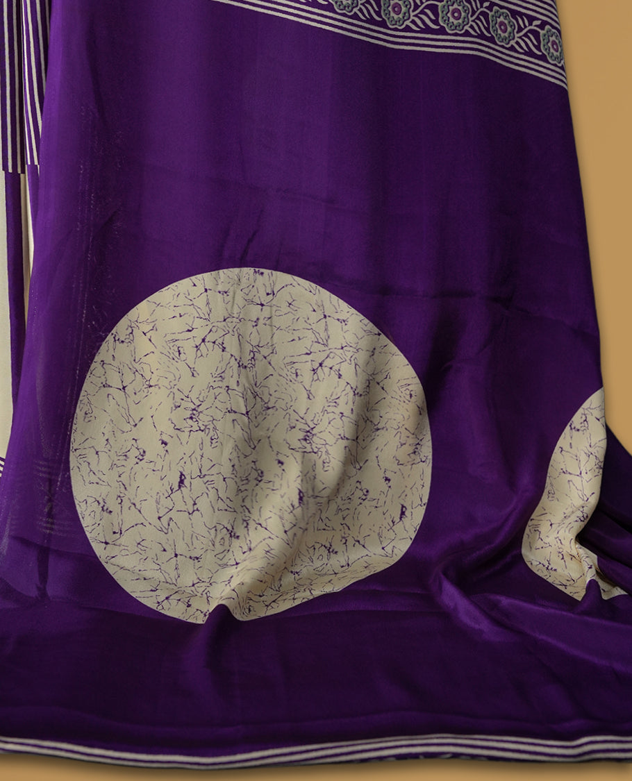 Purple and cream colour striped saree with intricate embroidered borders and bold round pallu motifs & Includes matching blouse piece.