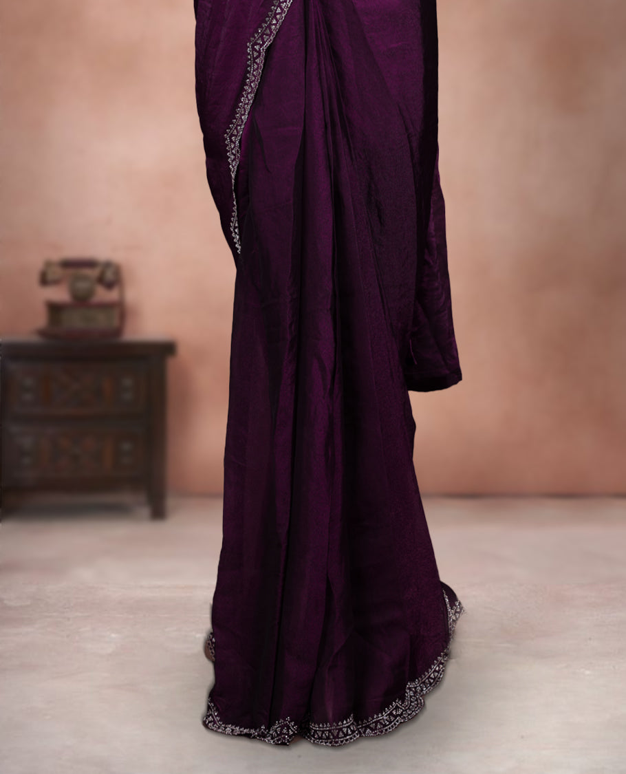 Elegant Wine Colour ready to wear saree adorned with rich silver zari and bead embroidery along the border and pallu, paired with a heavily embellished matching blouse for a grand festive look.
