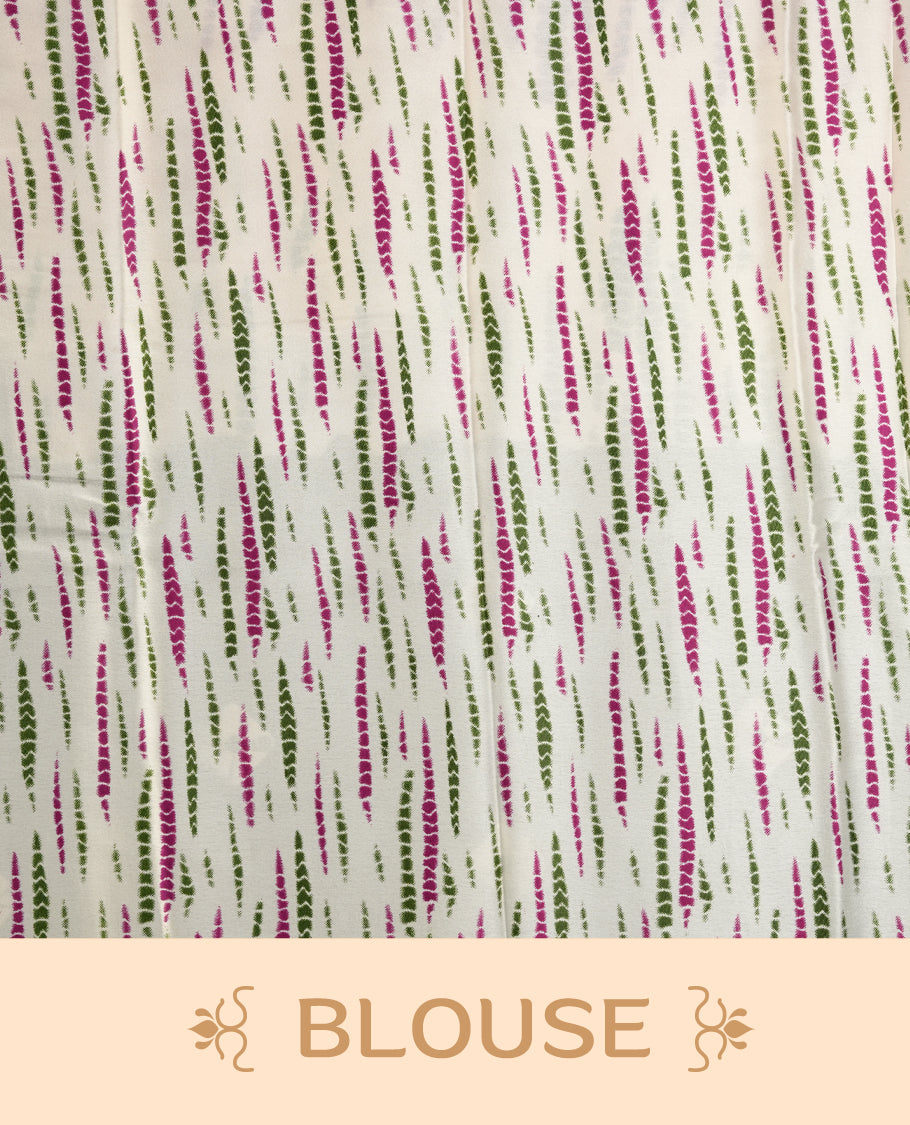 Rich green and purple saree adorned with small woven motifs on the body, enhanced by a contrast border, complemented with a traditional patterned pallu, and paired with a matching blouse.