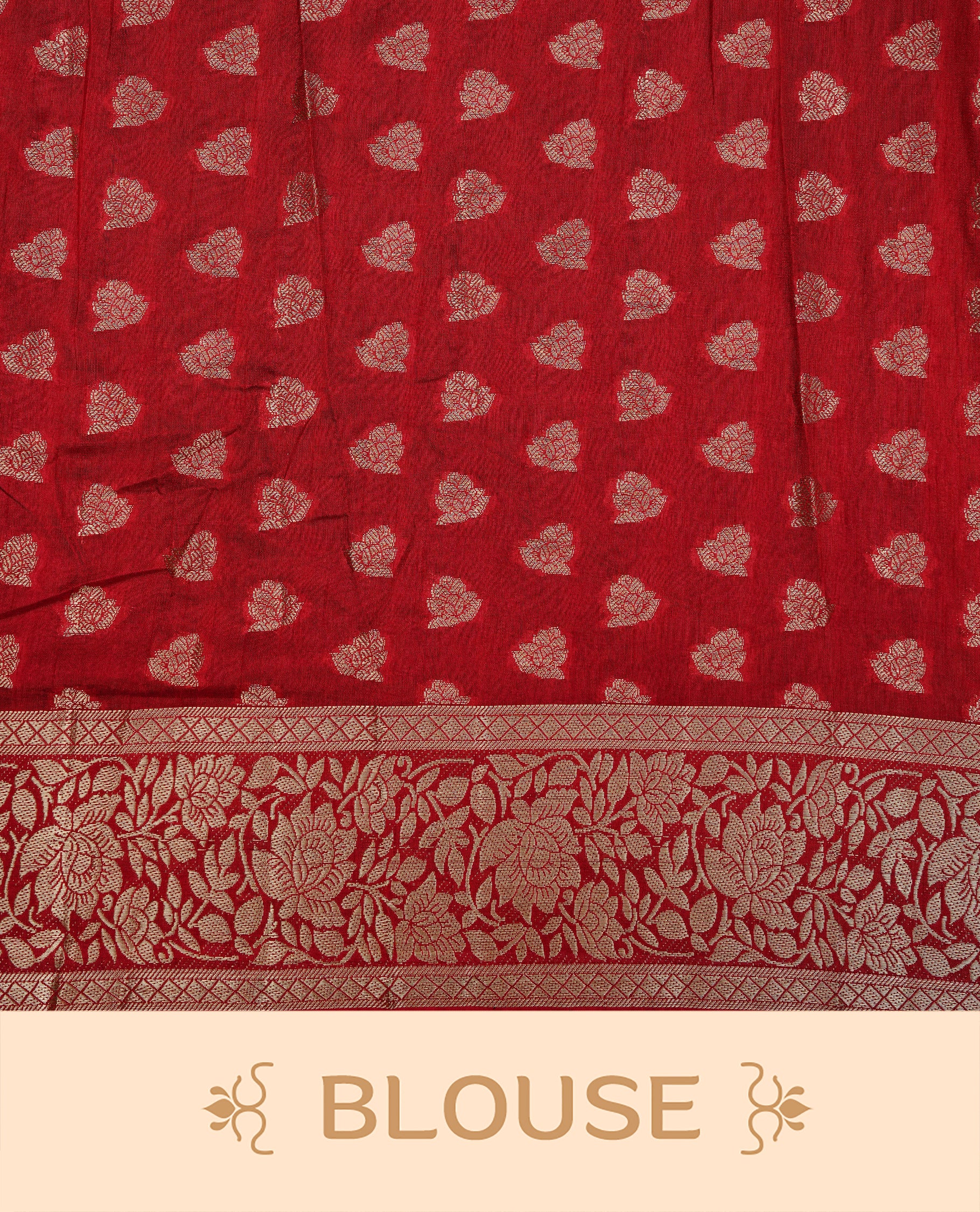 Red colour semi Tussar silk saree featuring an elegant plain body, complemented by a self colour border adorned with traditional gold zari floral kodi patterns. Comes paired with a matching blouse piece.