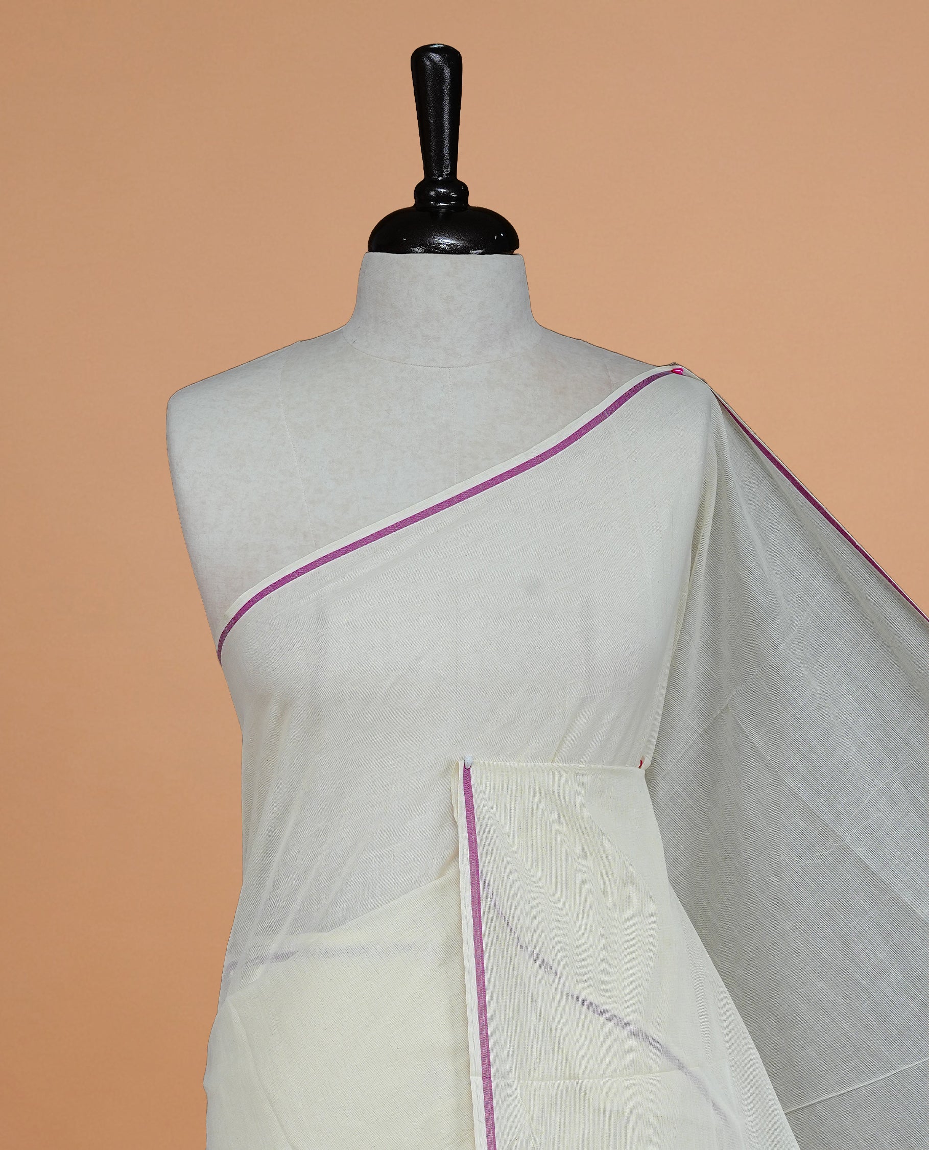 Cream Colour Cotton Kerala Saree Featuring A Classy Plain Body For Effortless Elegance, Enhanced By A Minimalist Magenta Border, Paired With A Matching Blouse Piece.