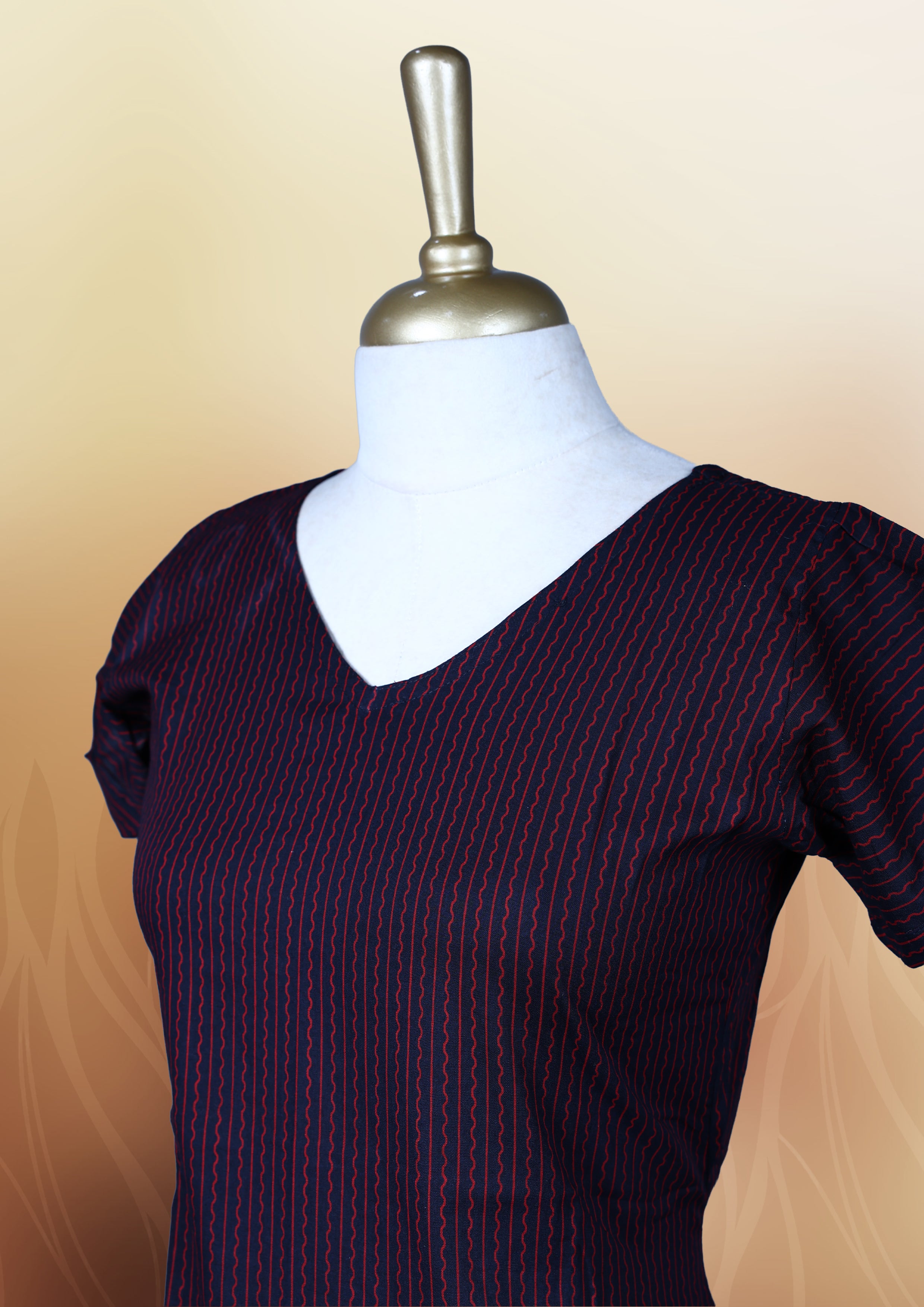 Dark blue colour nightwear with subtle stripes, featuring a flattering V neck and short sleeves, The flared hem adds charm, making it a perfect blend of elegance and comfort for any occasion.