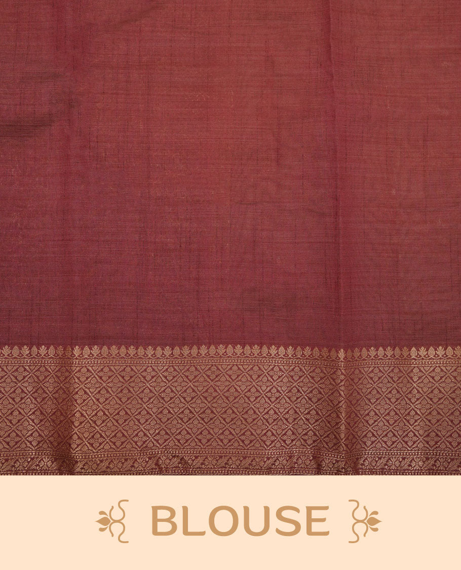 Light gold colour semi tussar saree featuring Gold zari buttas body, contrast chocolate brown colour gold zari border and comes with matching blouse piece.