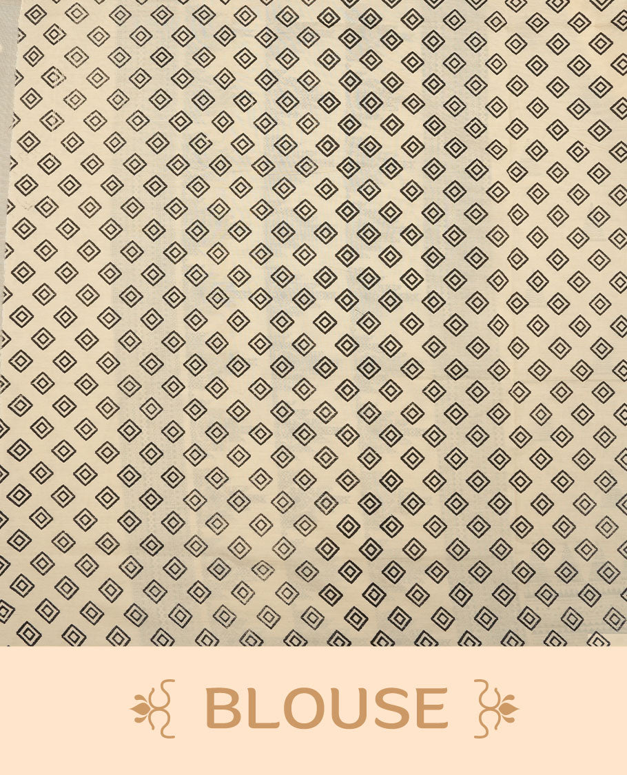 Cream colour poly cotton saree with black temple motifs on the body, paired with a matching with black woven traditional border, and a coordinated all‑over geometric printed blouse piece.