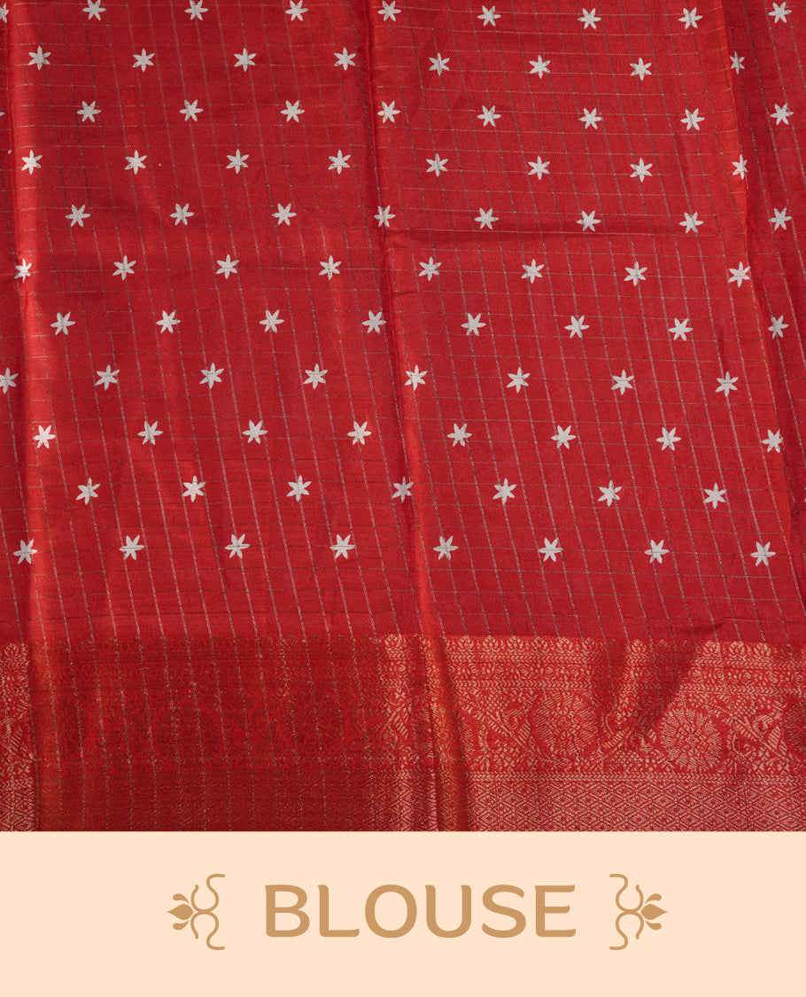 White saree adorned with red motifs, highlighted by a rich red zari border and pallu with traditional patterns and animal designs, paired with a matching blouse.