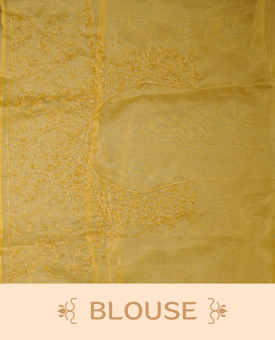 Yellow colour Organza designer saree featuring a thread geometric pattern across the body, enhanced with a piping border and cut beats work on matching blouse piece.