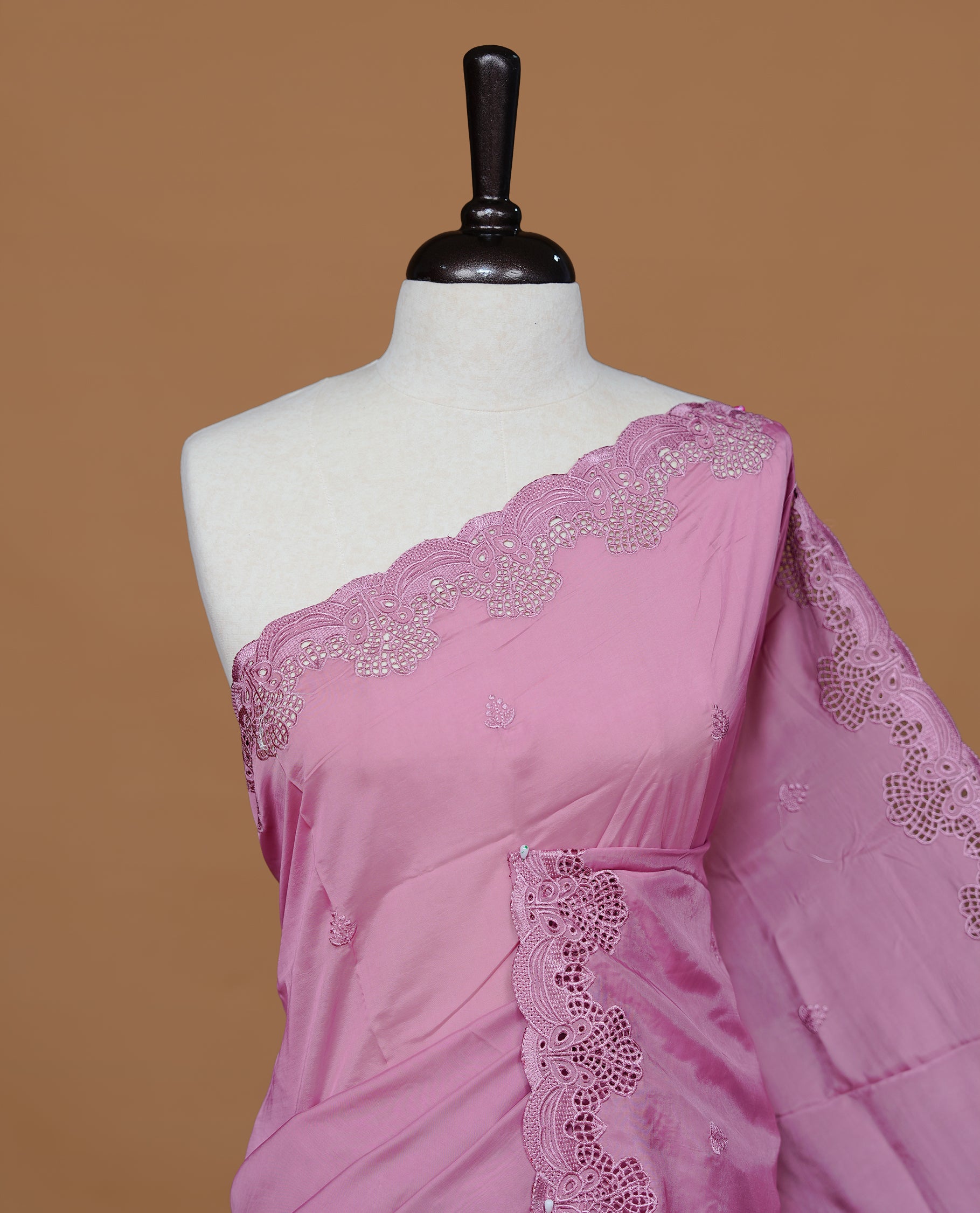 Pastel Pink colour Designer saree featuring Classic Plain body Styled with Thread motifs, Enrich with Thread & scalp border, paired with matching blouse piece.