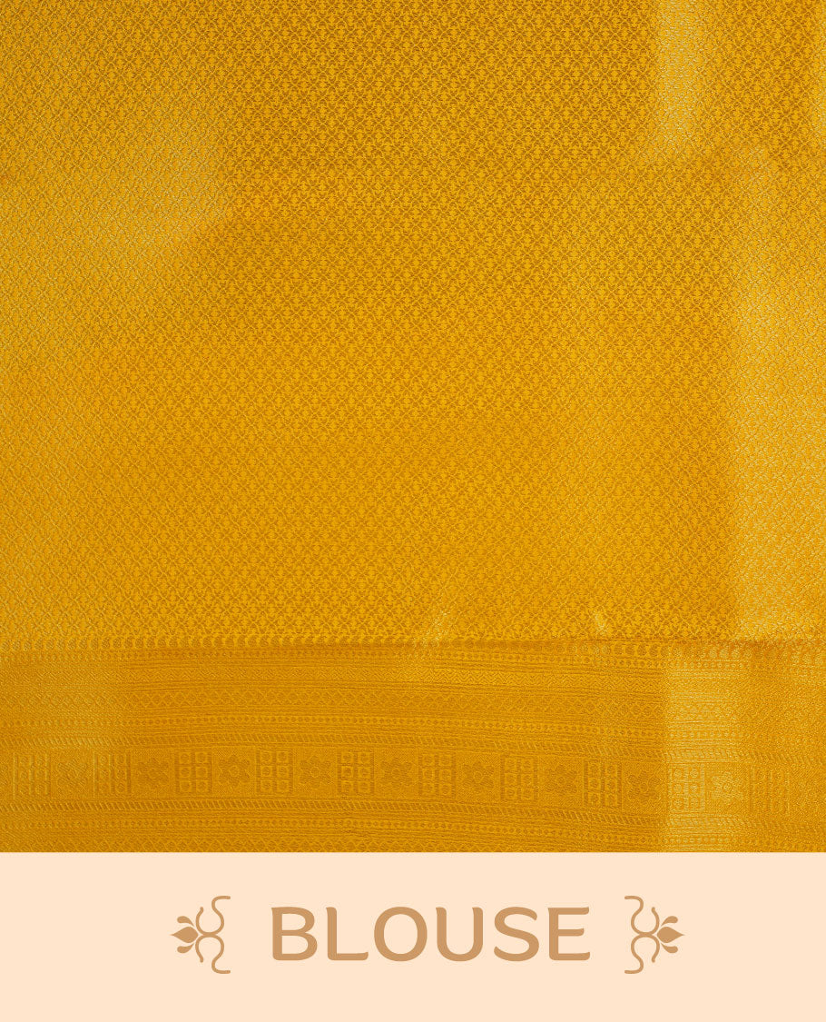 Mustard yellow colour semi soft silk brocade saree featuring subtle self-woven paisley motifs on the body, finished with an intricately woven matching border and pallu, paired with a coordinating blouse piece.