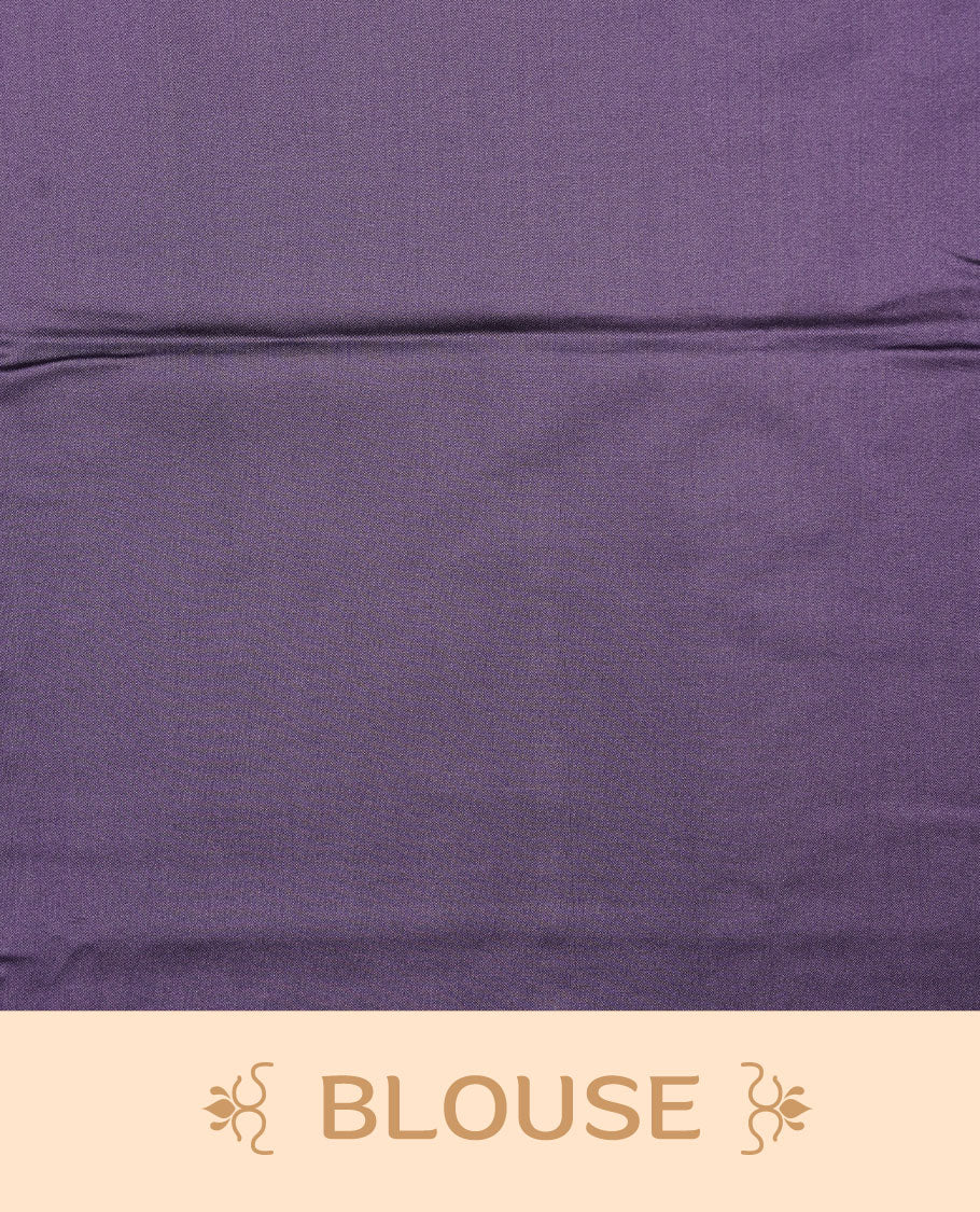 Lavender soft silk saree features a sleek borderless design with intricate antique zari motifs, flowing into a seamless self colored pallu and a matching blouse piece.