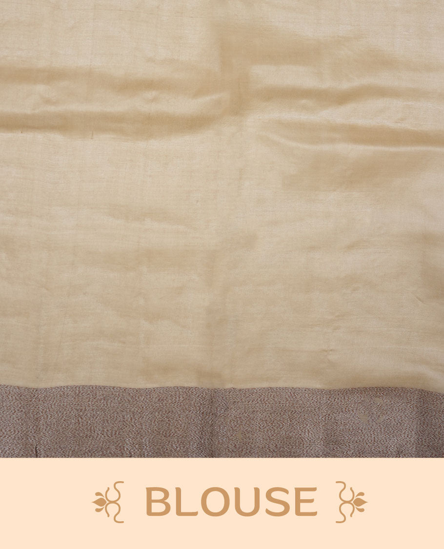 Dry olive colour pure banaras tusser silk saree highlighting antique zari pattern across body, with contrast cream colour with zari border and paired with matching blouse