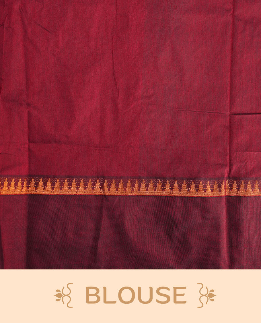 Green colour kalyani cotton saree featuring gold zari motifs on body, complemented by contrast maroon color with copper zari elephant pattern border , paired with matching blouse piece.