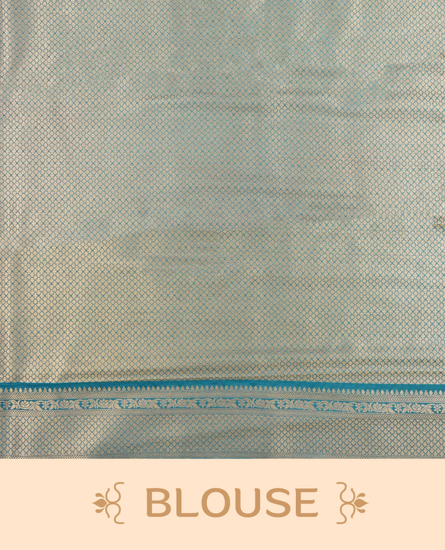 Teal blue colour semi silk brocade saree featuring intricate Gold Floral kodi patterns across the body, complemented by a Self colour woven border and pallu, paired with a matching blouse.
